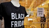 A photo shows a shop window where a poster announces Black Friday sales on November 24, 2017 in Marseille, southern France. AFP / Boris Horvat