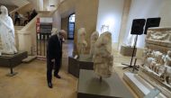 Lebanese Minister of Culture Ghattas Khoury inspects repatriated marble sculptures dating back to 4th to 6th centuries on display during a ceremony at Beirut National Museum in the Lebanese capital on February 2, 2018. AFP / Joseph Eid