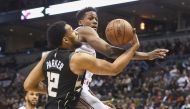 Milwaukee Bucks forward Jabari Parker (12) takes a shot while New York Knicks guard Frank Ntilikina (11) defends in the first quarter at the BMO Harris Bradley Center.  Benny Sieu