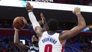 Memphis Grizzlies guard Ben McLemore (23) shoots on Detroit Pistons center Andre Drummond (0) in the first half at Little Caesars Arena. Rick Osentoski