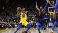 Oakland, CA, USA; Golden State Warriors forward Kevin Durant (35) picks up his dribble against Oklahoma City Thunder forward Paul George (13) in the third quarter at Oracle Arena. Cary Edmondson