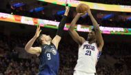 Philadelphia 76ers center Joel Embiid (21) shoots against Orlando Magic center Nikola Vucevic (9) during the second quarter at Wells Fargo Center.  Bill Streicher
