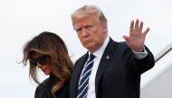 U.S. President Donald Trump and first lady Melania Trump step from Air Force One as they arrive in West Palm Beach, Florida, U.S., March 2, 2018. REUTERS/Kevin Lamarque
