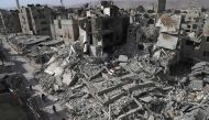 A general view shows several destroyed buildings in Douma, in the rebel enclave of Eastern Ghouta on the outskirts of Damascus on March 5, 2018. AFP / AMER ALMOHIBANY
