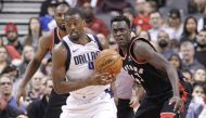 Toronto Raptors forward Serge Ibaka (9) and forward Pascal Siakam (43) defend against Dallas Mavericks forward Harrison Barnes (40) at the Air Canada Centre. Toronto defeated Dallas in overtime. John E. Sokolowski
