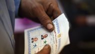 An Egyptian casts his vote at a polling station in Cairo's central Abdin neighbourhood on March 27, 2018, on the second day of voting in the 2018 presidential elections. AFP / Mohamed El-Shahed 