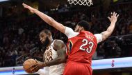 Cleveland Cavaliers forward LeBron James (23) drives to the basket against New Orleans Pelicans forward Anthony Davis (23) during the second half at Quicken Loans Arena. Ken Blaze
