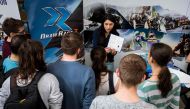 REPRESENTATIVE IMAGE: Romanian computer science students take part in an internship fair on the campus of the Polytechnic University on March 17, 2017 in Bucharest. (AFP / Andrei Pungovschi) 