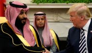 FILE PHOTO: US President Donald Trump shakes hands with Saudi Arabia's Crown Prince Mohammed bin Salman in the Oval Office at the White House in Washington, US March 20, 2018. REUTERS/Jonathan Ernst/File Photo