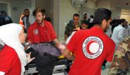 Wounded man arriving at a hospital in the Syrian capital Damascus, after rockets fired from Douma killed at least four civilians in various neighbourhoods across the capital. AFP / SANA