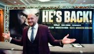 Former British heavyweight world boxing champion Tyson Fury gestures during a press conference to announce his comeback, in central London on April 12, 2018.  AFP / Ben Stansall