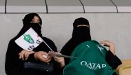 Saudi women watch the soccer match between Al-Ahli against Al-Batin at the King Abdullah Sports City in Jeddah, January 12, 2018. (Reuters / Reem Baeshen) 