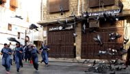 Saudi women jog in the streets of Jeddah's historic al-Balad district on March 8, 2018.  Amer Hilabi