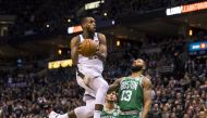 Milwaukee Bucks forward Khris Middleton (22) drives for a shot over Boston Celtics forward Marcus Morris (13) during the fourth quarter in game three of the first round of the 2018 NBA Playoffs at BMO Harris Bradley Center. Jeff Hanisch
