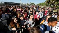 Students march to a park as part of a National School Walkout to honor the 17 students and staff members killed at the school in Parkland, Florida, March 14, 2018. (Reuters / Joe Skipper) 