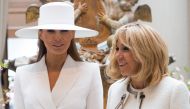 US First Lady Melania Trump and Brigitte Macron, wife of the French President, tour the National Gallery of Art in Washington, DC, April 24, 2018. AFP / Saul Loeb

