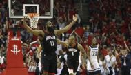 James Harden #13 of the Houston Rockets reacts in the second half during Game Five of the first round of the 2018 NBA Playoffs against the Minnesota Timberwolves at Toyota Center on April 25, 2018 in Houston, Texas.Tim Warner/AFP 
