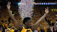 Donovan Mitchell #45 of the Utah Jazz celebrates the Jazz win at the end of Game Six of Round One of the 2018 NBA Playoffs against the Oklahoma City Thunder at Vivint Smart Home Arena on April 27, 2018 in Salt Lake City, Utah.   Gene Sweeney Jr./AFP 
