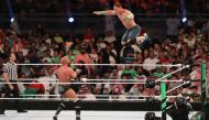 John Cena (R) competes with Triple H (L) during the World Wrestling Entertainment (WWE) Greatest Royal Rumble event in the Saudi coastal city of Jeddah on April 27, 2018. AFP