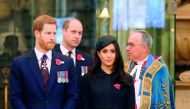 Britain’s Prince Harry (left), his US fiancee Meghan Markle (second right), Britain’s Prince William, Duke of Cambridge, (second left) and the Dean of Westminster John Hall during a service of commemoration and thanksgiving to mark Anzac Day in Westminste