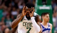 Boston Celtics guard Jaylen Brown (7) reacts after scoring against the Philadelphia 76ers during the second half in game five of the second round of the 2018 NBA Playoffs at the TD Garden.Greg M. Cooper
