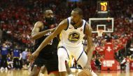 Golden State Warriors forward Kevin Durant (35) dribbles against Houston Rockets guard James Harden (13) during the fourth quarter in game one of the Western conference finals of the 2018 NBA Playoffs at Toyota Center. Troy Taormina-USA TODAY Sports