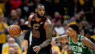 Cleveland Cavaliers forward LeBron James (23) drives to the basket against Boston Celtics guard Marcus Smart (36) during the forth quarter in game four of the Eastern conference finals of the 2018 NBA Playoffs at Quicken Loans Arena. David Richard
