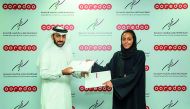 Manar Khalifa Al Muraikhi, Director of PR and Corporate Communications of Ooredoo; and Mohammed Al Malki, Director of Public Relations and Communication at the General Retirement and Social Insurance Authority, announcing the new offers for retired custom