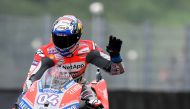 Ducati Team's Italian Andrea Dovizioso waves during a free practice session ahead of the Italian Moto GP Grand Prix at the Mugello racetrack in Scarperia e San Piero, on June 1, 2018. AFP / Tiziana Fabi 