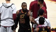 LeBron James #23 of the Cleveland Cavaliers reacts with Jeff Green #32 late in the game against the Golden State Warriors during Game Four of the 2018 NBA Finals at Quicken Loans Arena on June 8, 2018 in Cleveland, Ohio.  Jason Miller/Getty Images/AFP 