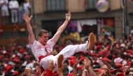 A reveller is thrown into air by others during the opening the San Fermin festival in Pamplona, Spain, July 6, 2018. Reuters/Susana Vera