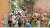 Members of Urban Coup tour the site of their planned co-housing project in Melbourne, Australia. Thomson Reuters Foundation/ Urban Coup