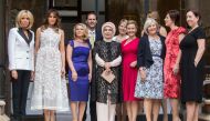 
French First lady Brigitte Macron, US First Lady Melania Trump, Malgorzata Tusk, Husband of Luxembourg's pime minister Gauthier Destenay, First Lady of Turkey Emine Gulbaran Erdogan, Partner of Estonia's Prime Minister Karin Ratas, Partner of Slovenia's