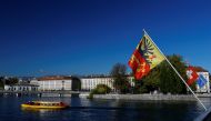 A Geneva flag is pictured on the Pont du Mont-Blanc near the harbor in Geneva, Switzerland October 10, 2017. Reuters/Denis Balibouse

