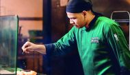 Chef Bradley Mathias cooking a dish at Hunters Room & Grill at The Westin Doha  Hotel and Spa. 