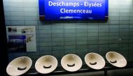 A metro sign “Champs-Elysees Clemenceau” renamed with France’s soccer coach Didier Deschamps to celebrate his World Cup win is seen at a subway train station in Paris, yesterday.