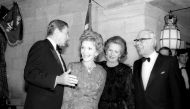 US President Ronald Reagan and Nancy Reagan escort Margaret Thatcher and husband Dennis to the British Embassy in Washington in this February 20, 1985 file photo. Reuters/Charles Cancellare

