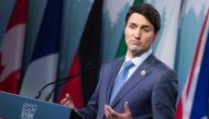 Canadian Prime Minister Justin Trudeau addresses a press conference at the conclusion of the G7 summit in La Malbaie, Quebec on June 9, 2018.  AFP / Lars Hagberg 