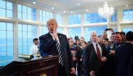 US President Donald Trump makes a comment to the press about former aid Omarosa Manigault Newman while meeting with supporters during a Bikers for Trump event at the Trump National Golf Club August 11, 2018 in Bedminster, New Jersey.  AFP / Brendan Smialo