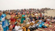 Folk artists play traditional music for tourists at Kashgar, Xinjiang Uighur Autonomous Region, China,  May 2, 2016. Reuters/Stringer