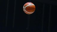 Unified Korea's Choi Eunsil (L) shoots over Taiwan's Wu Yingchieh (C) in the women's basketball semi-final match between Taiwan and Unified Korea during the 2018 Asian Games in Jakarta on August 30, 2018. AFP / Lillian Suwanrumpha
