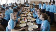 Teenagers have lunch at the Artek international children centre in Gurzuf, some 15 kms outside Yalta AFP