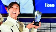 Japan's swimmer Ikee Rikako, who won six gold medals during the games, poses after being named as the 