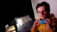 Mauricio Villamizar, co-founder of Pop & Rest sits on a bed at his premises, allowing workers and travellers a place to rent by the hour to relax and rest in Shoreditch, London, Britain, September 18, 2018. REUTERS/Toby Melville