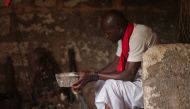 Juju priest David Ubebe performing a ceremony in his shrine, Benin, Nigeria, July 1, 2018. Thomson Reuters Foundation/Kagho Idhebor 