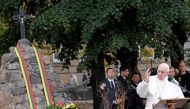 Pope Francis gives a speech in front of a memorial at the Museum of Occupations and Freedom Fights on September 23, 2018, in Vilnius on the second day of his visit to Lithuania.  AFP / Janek Skarzynski 
 