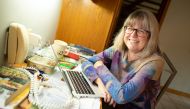 Donna Strickland, an associate professor at the University of Waterloo, at the desk where she watched the press conference this morning after winning the Nobel Prize for Physics at her home in Waterloo, Ontario, Canada October 2, 2018. Reuters/Peter Power