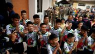 Twelve boys and their soccer coach who were rescued from a flooded cave in Thailand are seen in the northern province of Chiang Rai, July 18, 2018. Three of the boys and their coach were stateless. Reuters/Soe Zeya Tun