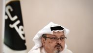 In this file photo taken on December 15, 2014, general manager of Alarab TV, Jamal Khashoggi, looks on during a press conference in the Bahraini capital Manama. AFP / Mohammed Al-Shaikh 