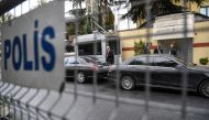 Security members of the Saudi consulate stay next to Diplomatic vehicles on October 17, 2018 at the Saudi Arabian consulate in Istanbul. AFP / OZAN KOSE